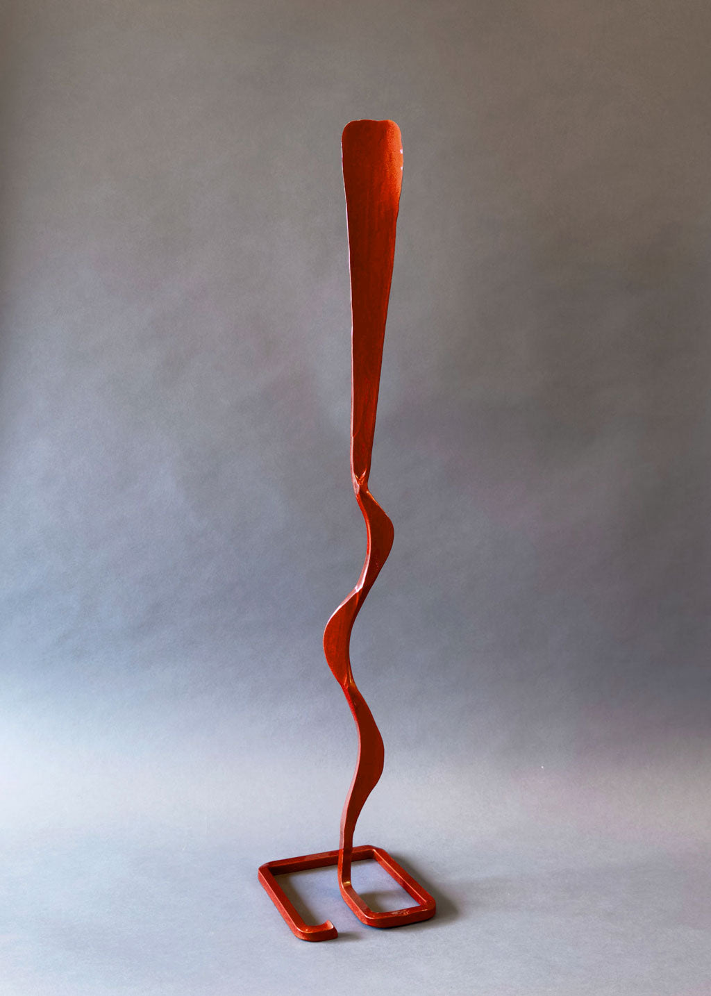 Hand-forged Copper Feather Mesa Bloom steel sculpture with a single feather-like element rising from a self-standing square base, designed for minimalist outdoor décor and landscape art
