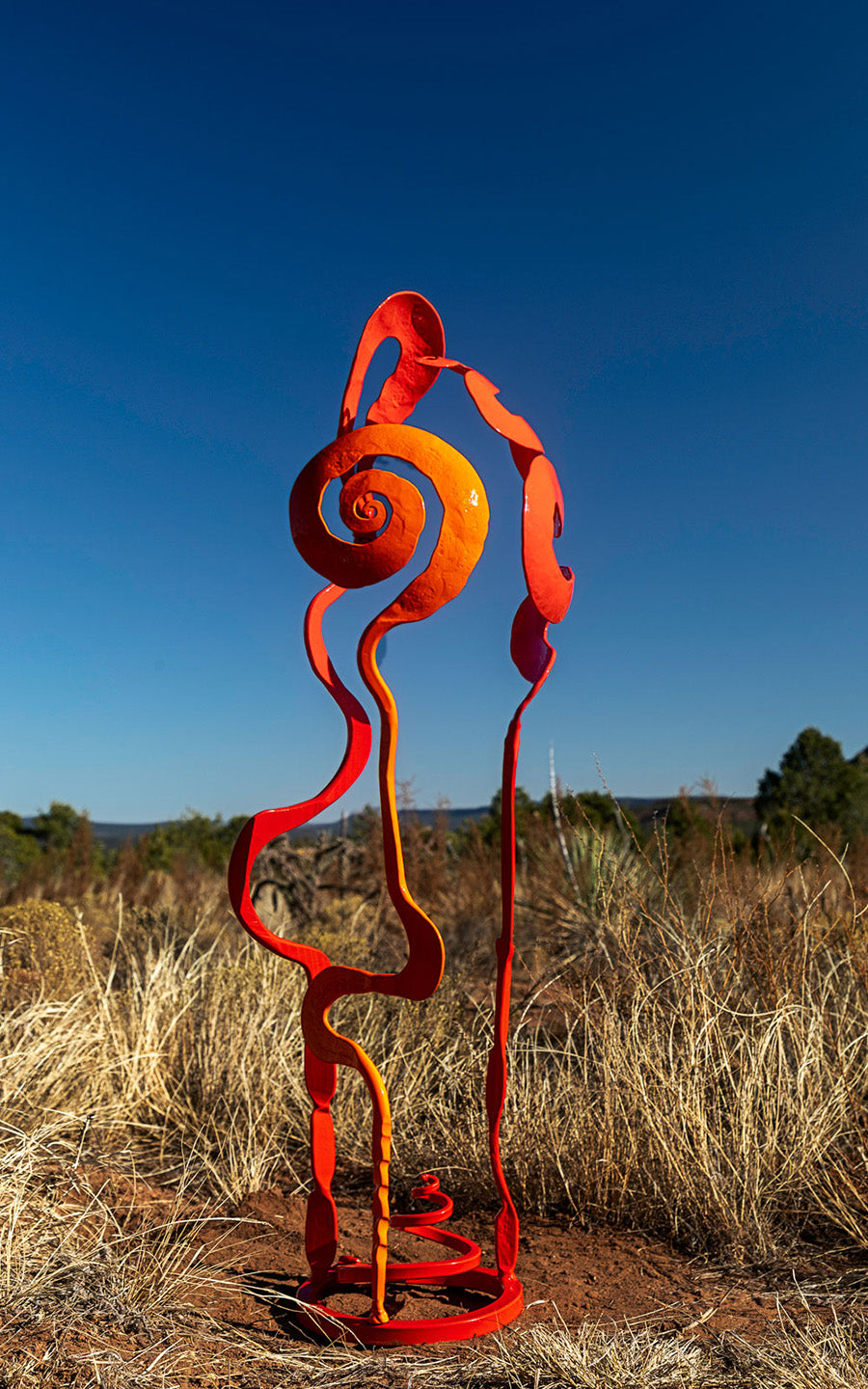 Orange and red baby bloom steel sculpture.