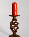 Rust finished hand forged Swirl Candlestick with a wide base and spiral design.