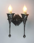 Double Calla Wall Sconce featuring two calla lilies and two candle light bulbs.
