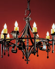 Large wrought iron chandelier. Product is Grande Rustic Fleur Chandelier.