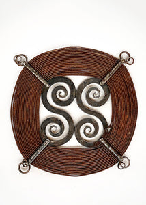 "Windings" forged steel sculpture with a rust finish. 
