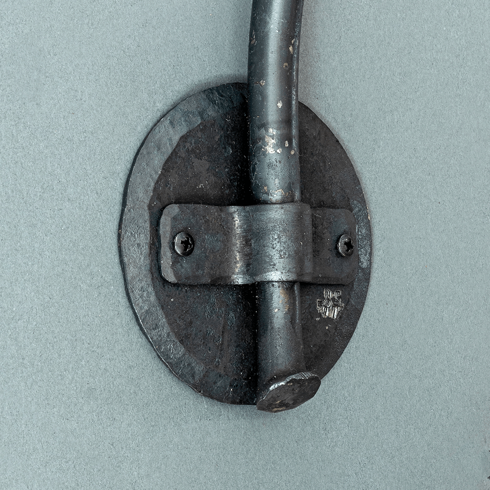 Round forged steel backplate for "Calla Wall Sconce" by Christopher Thomson Ironworks.