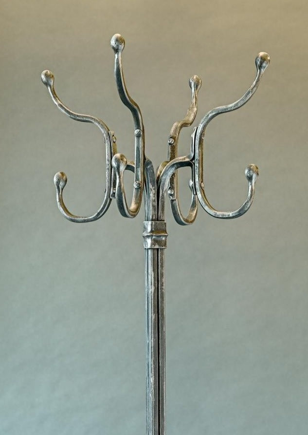 Top half of hand forged Wrought Iron Standing Coat Rack with hat hooks. Shown with a Pewter Black finish.