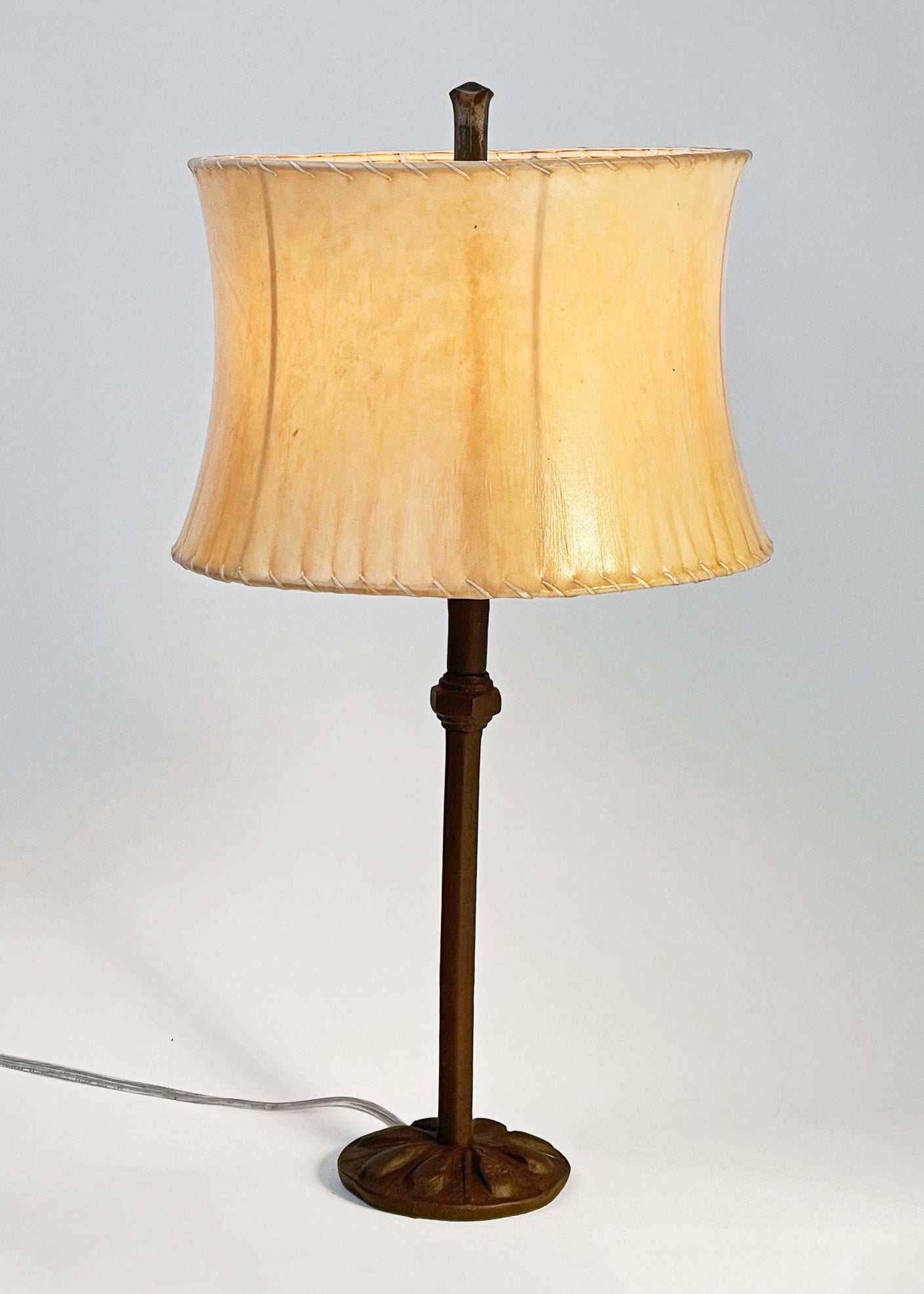 Wrought Iron Etruscan Lamp shown with a Contemporary Drum Sheepskin Shade.