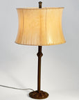 Wrought Iron Etruscan Lamp shown with a Contemporary Drum Sheepskin Shade.