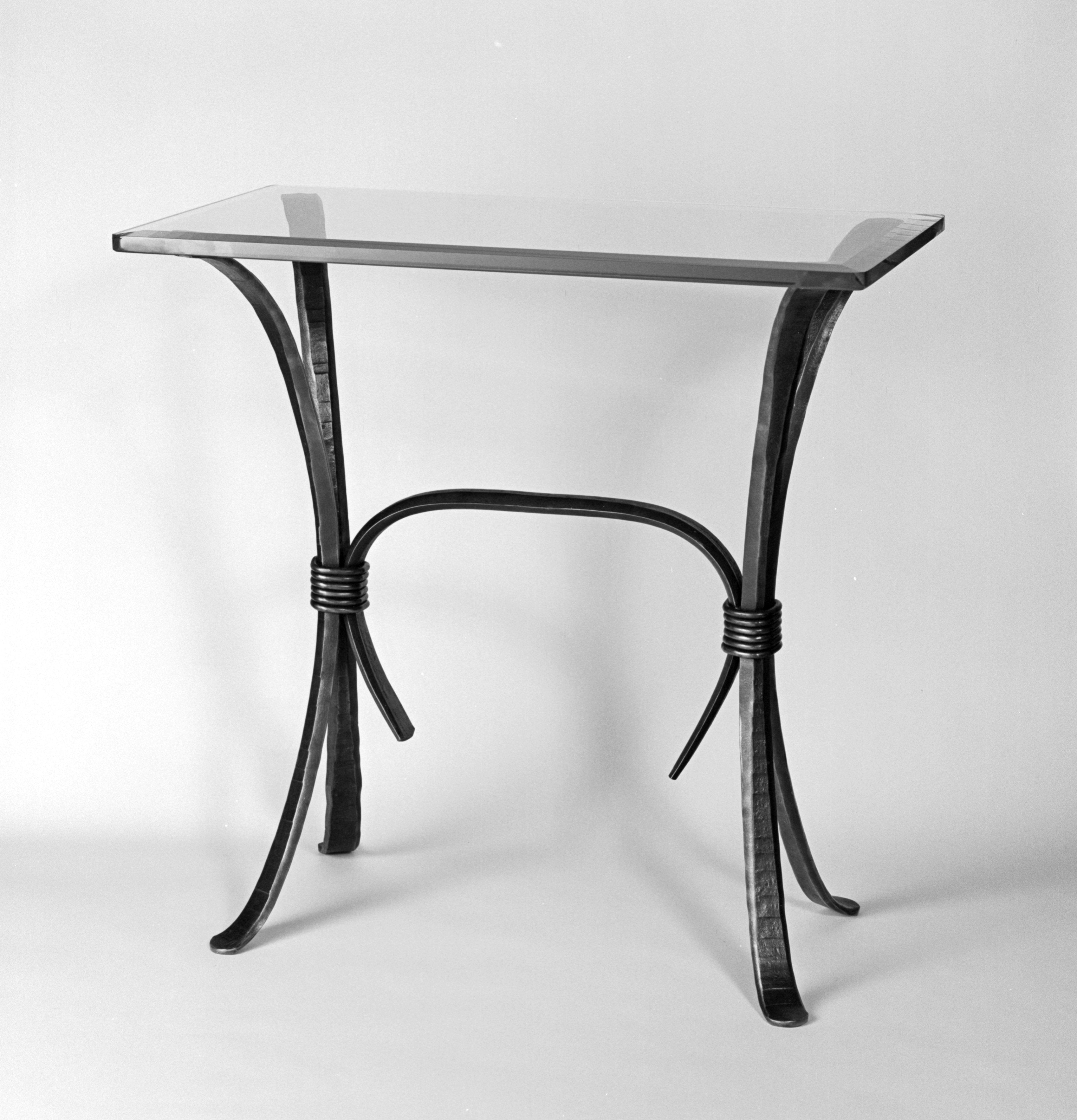 Mid sized wrought iron foyer table, handmade with forged steel.