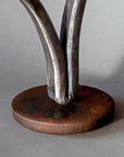 Round rust finished base for Christopher Thomson's Opening Heart Sculpture.