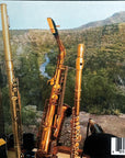 Inside sleeve of Pecos Canyon Flute Meditation showing musical instruments in front of a window overlooking a river. Barcode reads 89211 05773.