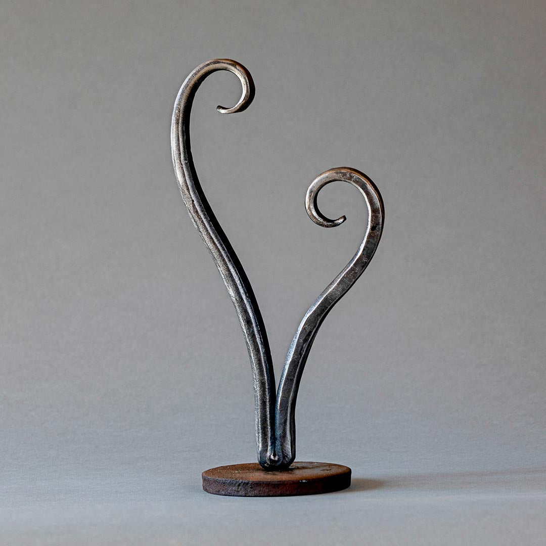 Wrought iron hand forged heart sculpture.