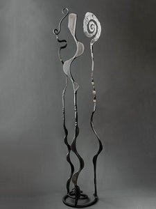 High end metal sculpture with a metallic black finish made by blacksmith Christopher Thomson's Blooms sculpture series.