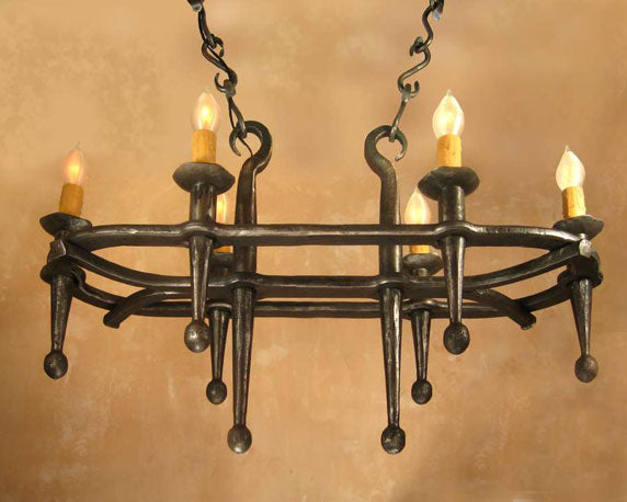 Oval Rustic Fleur Wrought Iron Chandelier. 