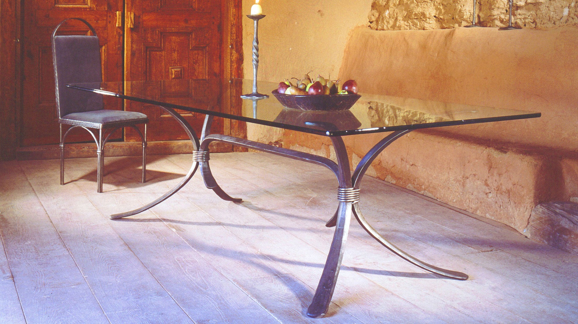 Hand forged ironworks dining furniture by New Mexico blacksmith, Christopher Thomson.