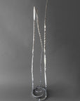 Chrome Baby Pajo hand forged steel sculpture, side view showing uneven height and curve of the three forms