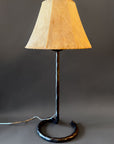 Wrought iron Circle Lamp with a handmade sheepskin shade.