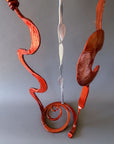 Detail of the hand forged steel base and lower sculptural elements of the Copper & Chrome Baby Bloom, highlighting craftsmanship and powder-coated finishes.