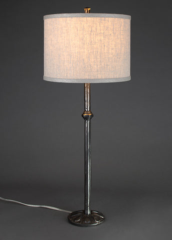 High end iron lamp with a woven linen drum shade. Hand forged by Christopher Thompson Ironworks.