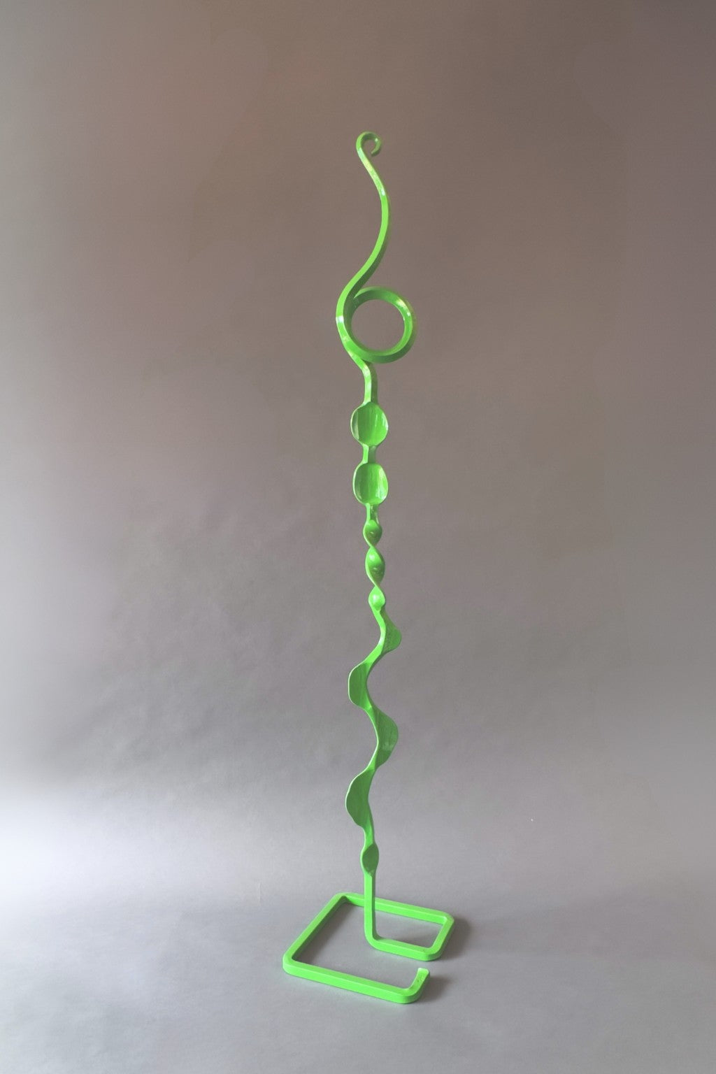 Green free standing metal sculpture: Green Doodle Wisp Mesa Bloom