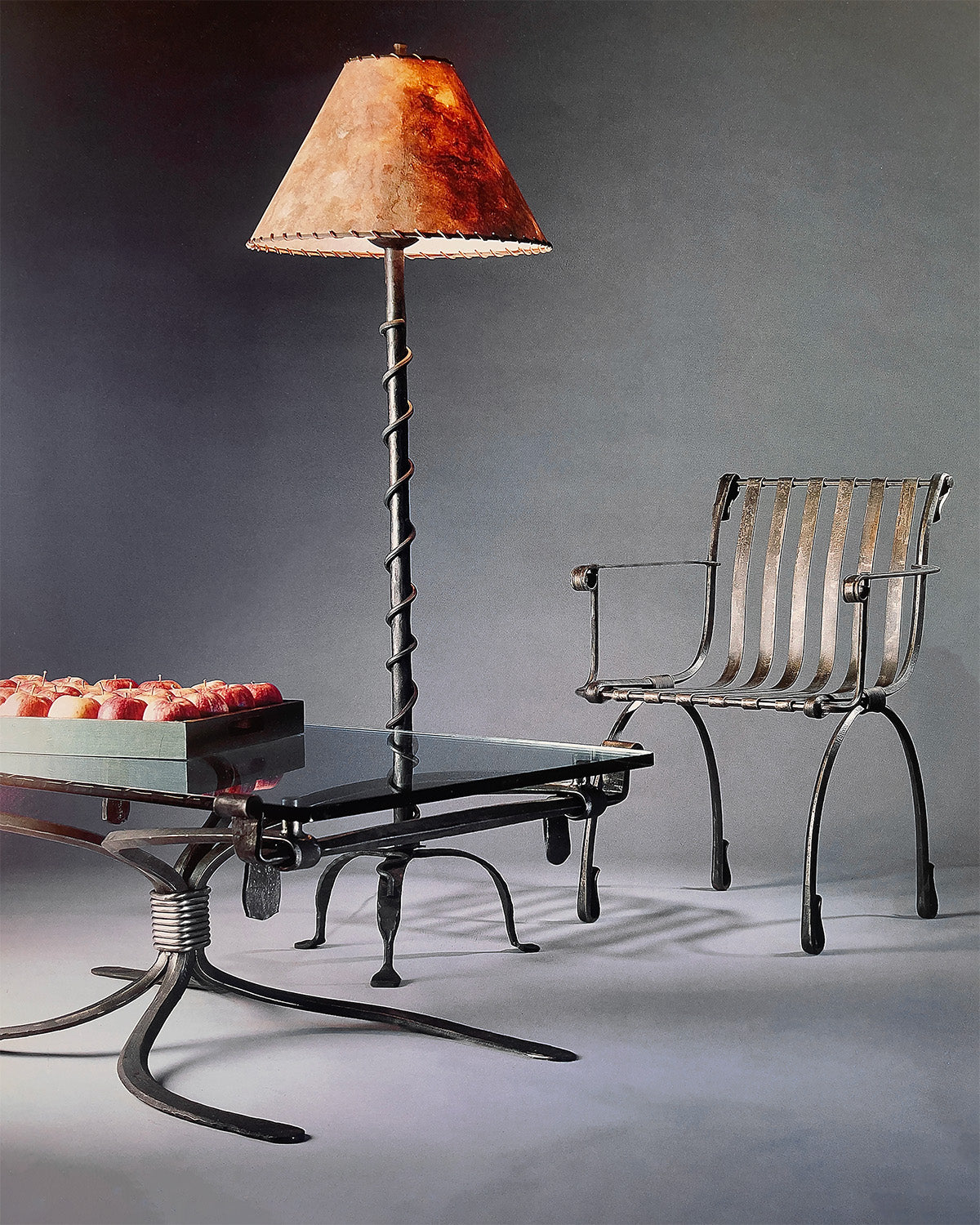 Hacienda Wrought Iron Coffee Table with wrought iron floor lamp and chair.