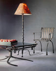 Hacienda Wrought Iron Coffee Table with wrought iron floor lamp and chair.