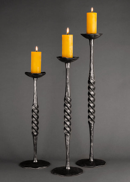 Three heavy duty Spiral wrought iron candlestick holders made by blacksmith Christopher Thompson Ironworks.