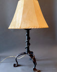 Vine Iron lamp with a sheepskin shade.