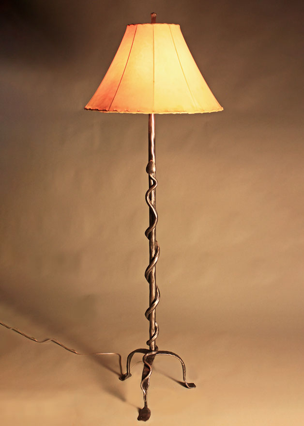 Hand forged steel Western Iron Floor Lamp with a rattlesnake design by blacksmith Christopher Thompson.