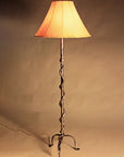 Hand forged steel Western Iron Floor Lamp with a rattlesnake design by blacksmith Christopher Thompson.