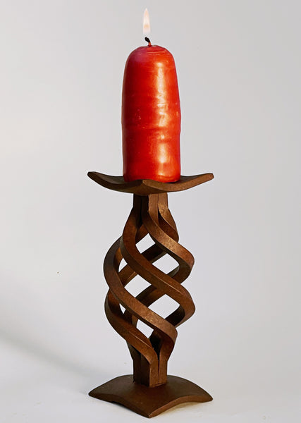 Rust finished hand forged Swirl Candlestick with a wide base and spiral design.