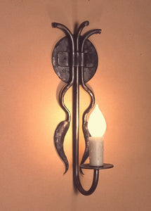 Forged steel "Candle Wall Sconce" with two chilies and a candle light bulb, shown in Pewter Black.