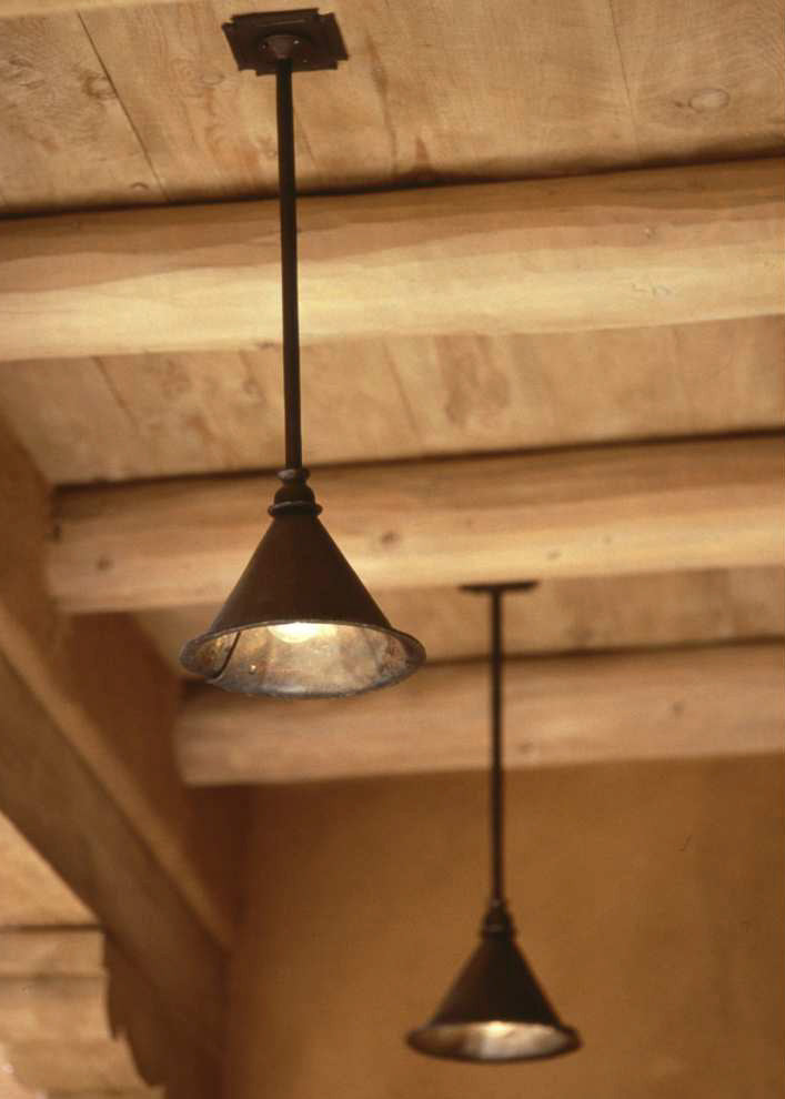 Three medium sized hand forged &quot;Ceiling Pendants&quot; with a Rust finish.