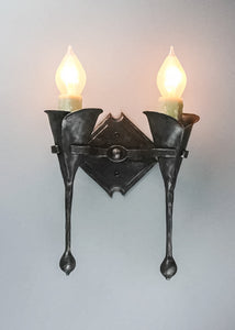 Double Calla Wall Sconce featuring two calla lilies and two candle light bulbs.