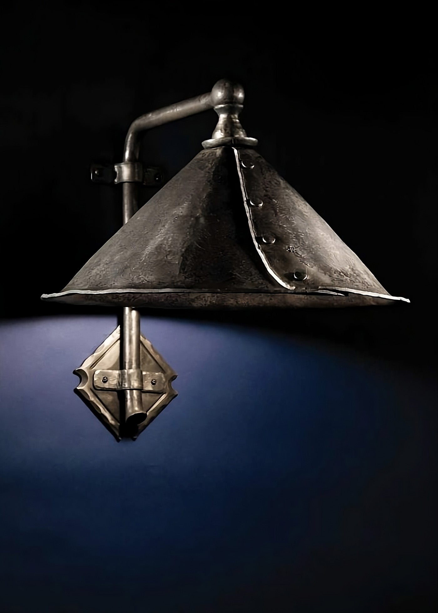 Estate Iron Wall Sconce with an 90 degree arm bend a large cone shaped hood.