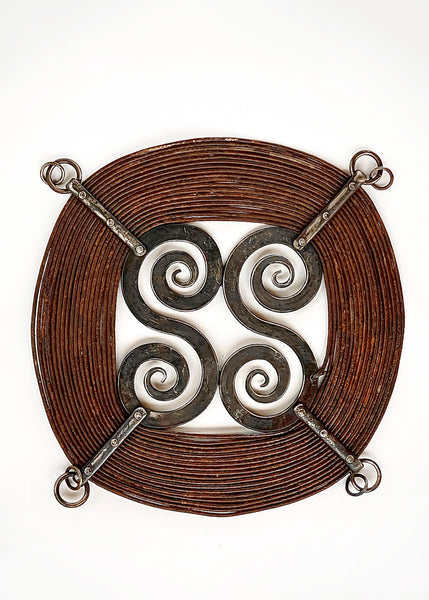  "Windings" forged steel sculpture with a rust finish. 