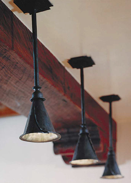 Three small sized hand forged "Ceiling Pendants" with a Rustic Black finish.